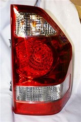 FAROL TRA DER MITSUBISHI MONTERO 03