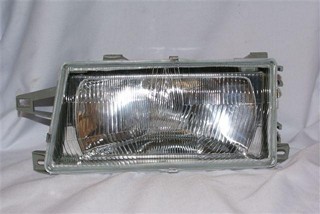 SEMIOPTICA IZQ FIAT UNO 91-04 (VIDRIO) (B)
