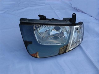 SEMIOPTICA IZQ MITSUBISHI L200 2WD 06 (MAN) DEPO