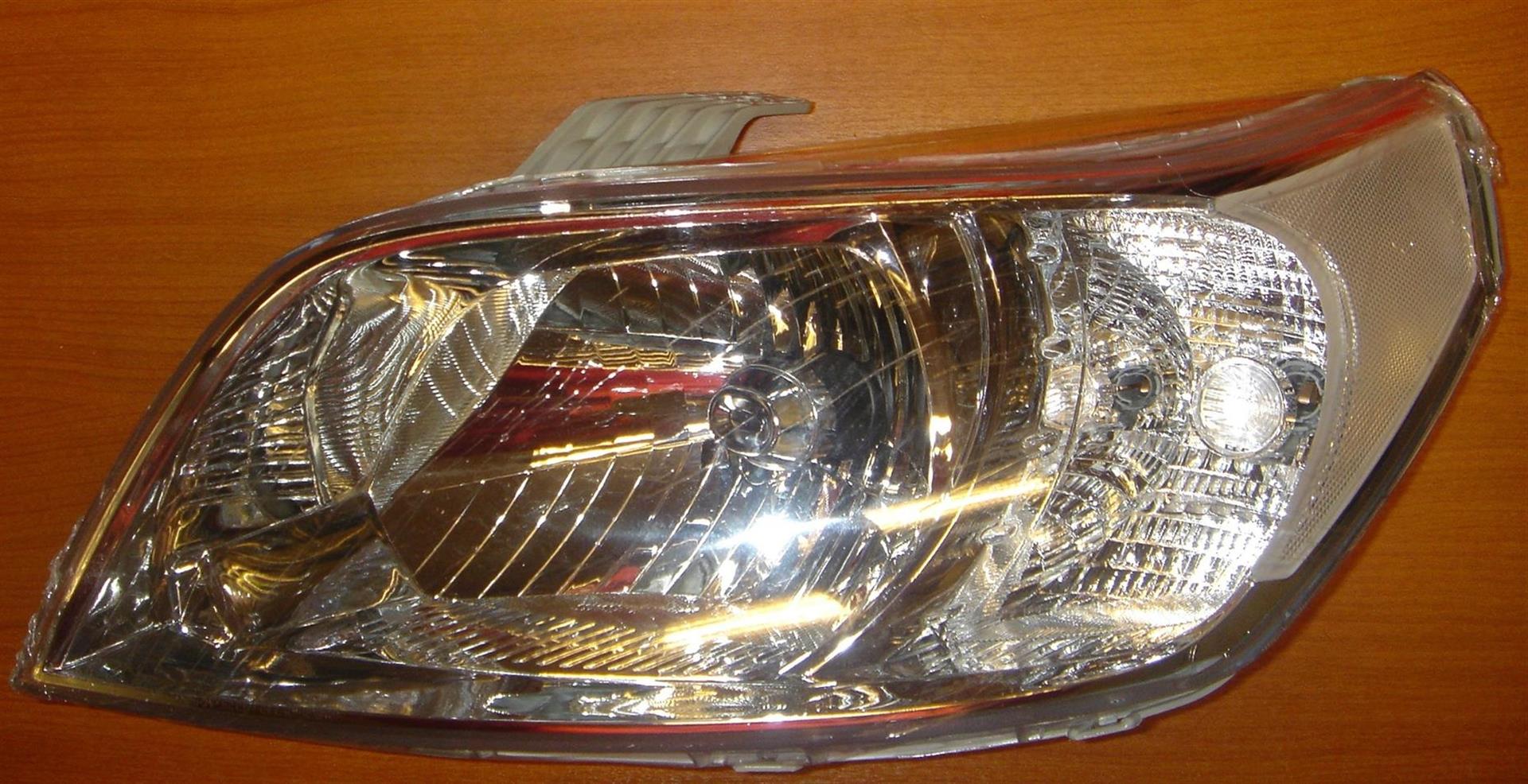 SEMIOPTICA IZQ GM AVEO (G3 ) 12 DEPO