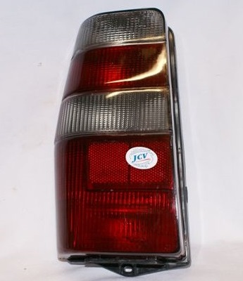 FAROL TRA IZQ FIAT FIORINO-ELBA 92 (FUME) (B)